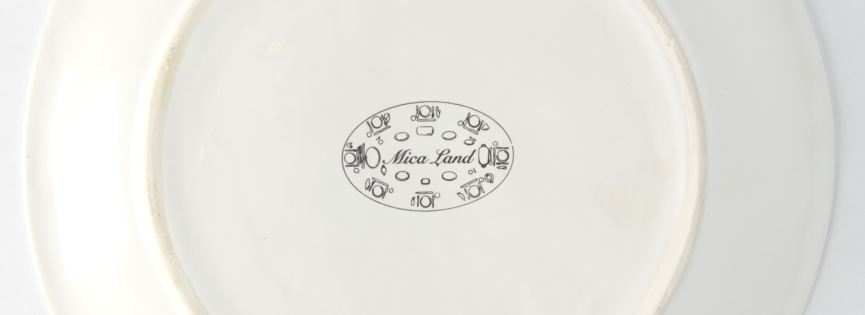 Mica Land maker's stamp on stoneware